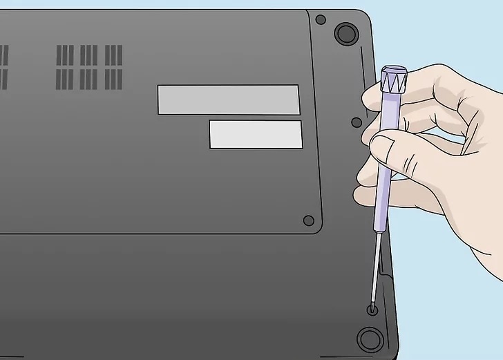 3. Turn the laptop over and remove the screws