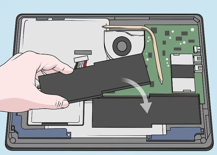 8. Insert the new battery